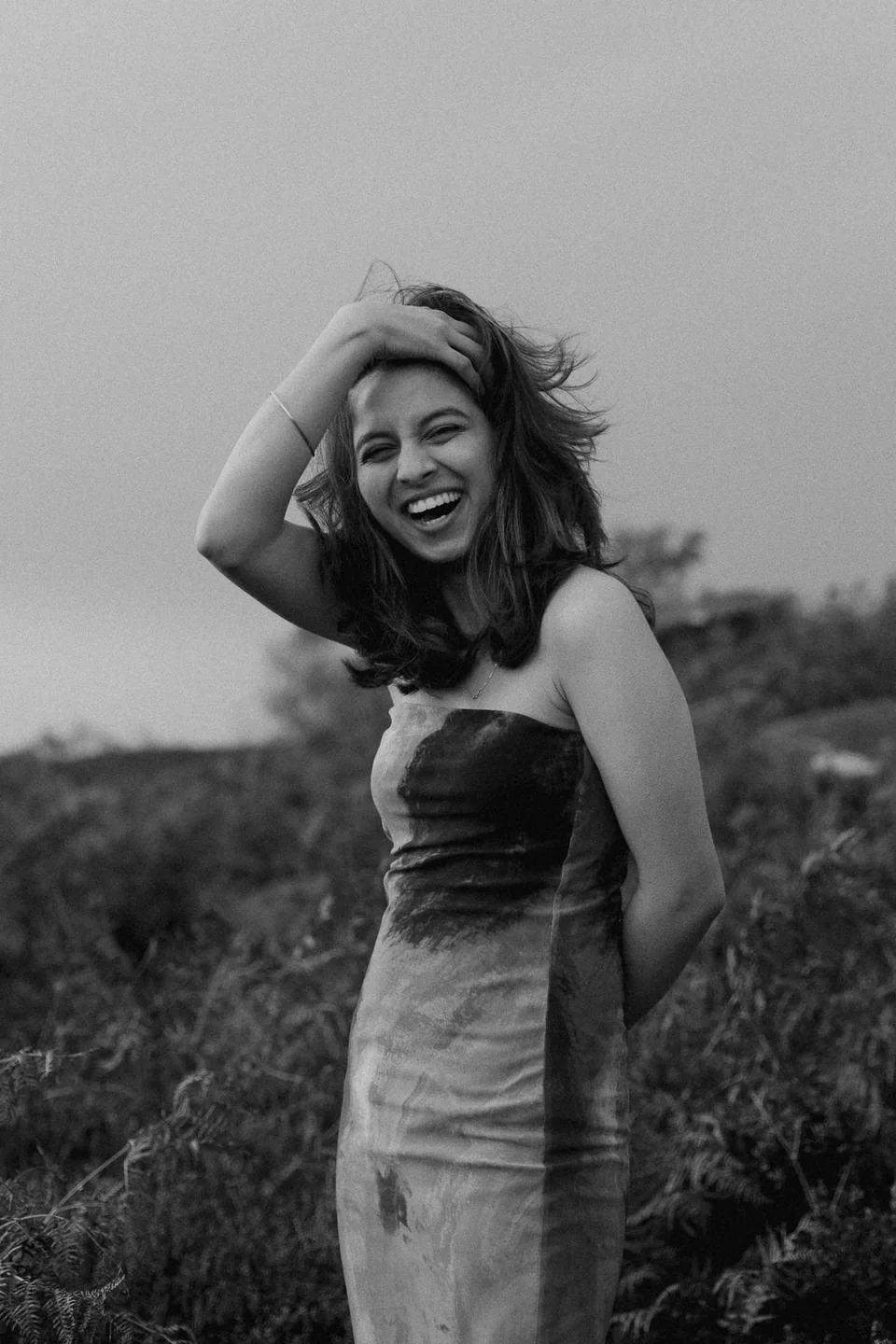 Smiling outdoor portrait of Shrinkhla with wind in her hair